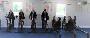 Image of students using equipment in new fitness suite.