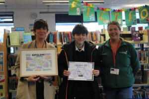 Photo of winning student with Mrs Cross and Sam Turner from Sustrans. 